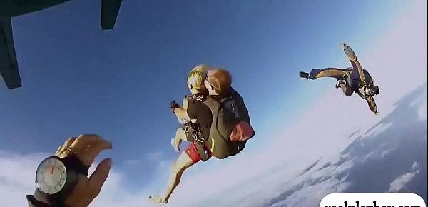  Badass babes sky diving while all naked with the champ